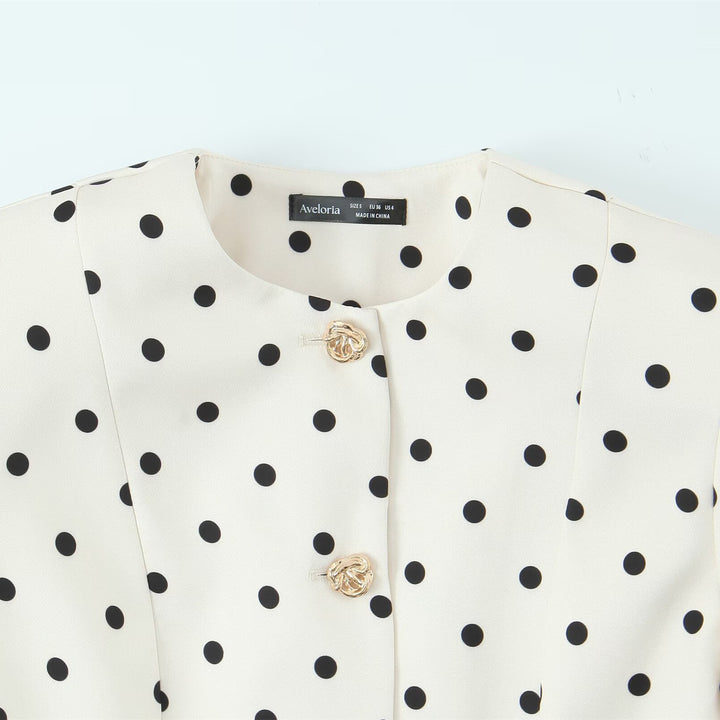 Damer elegant blus med puffärmar och knapppdetaljer Mirla-Eva Jonsson