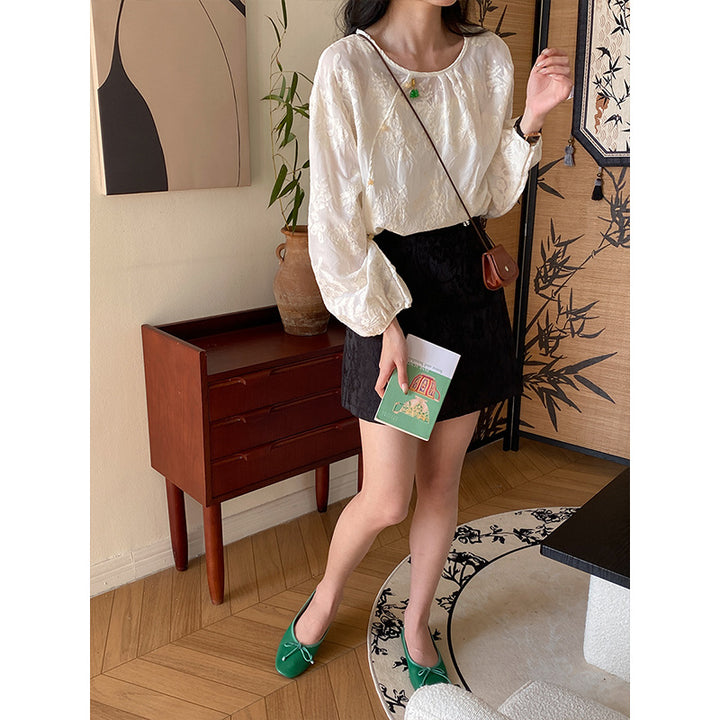 Damer elegant blus med puffärmar och raffinerad tyg Mirla-Eva Jonsson