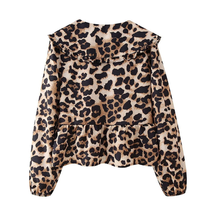 Damer elegant blus med ruffled krage och leopardmönster Mirla-Eva Jonsson