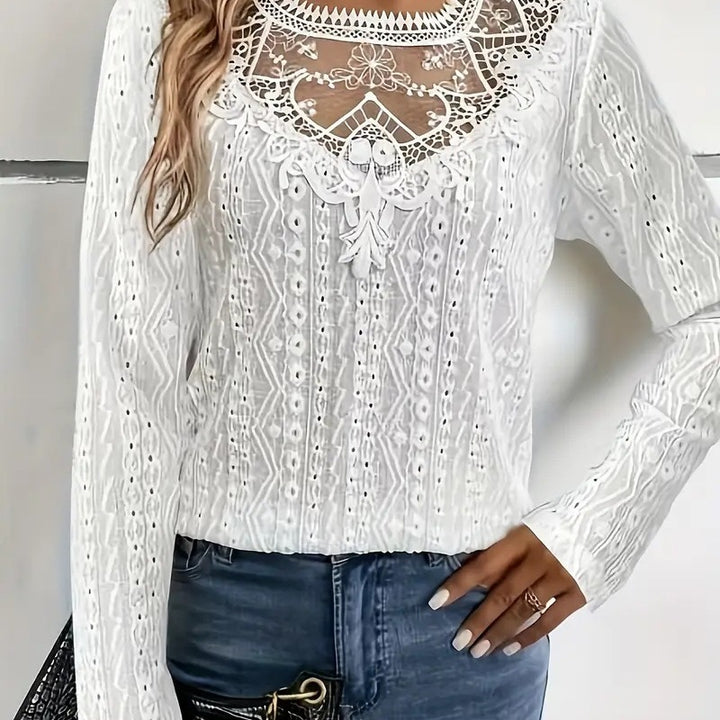 Damer elegant blus med spetsinsatser och detaljerat hålmönster Mirla-Eva Jonsson