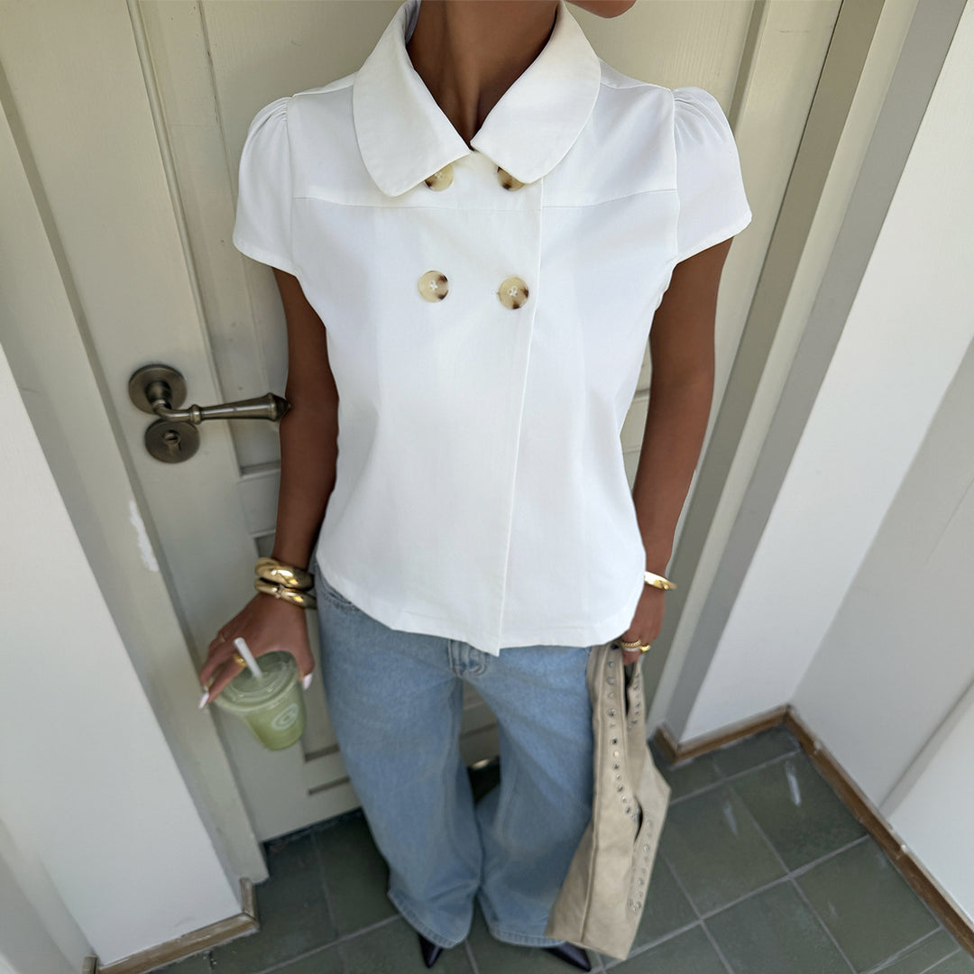 Damer elegant blus med stiliga knappdetaljer och krage Mirla-Eva Jonsson