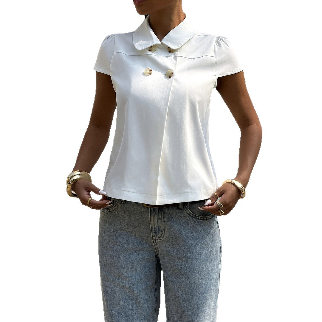 Damer elegant blus med stiliga knappdetaljer och krage Mirla-Eva Jonsson