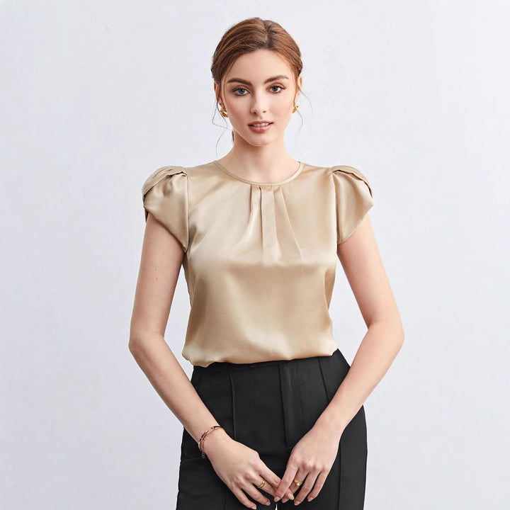 Damer elegant blus med strukturerade puffärmar Mirla-Eva Jonsson