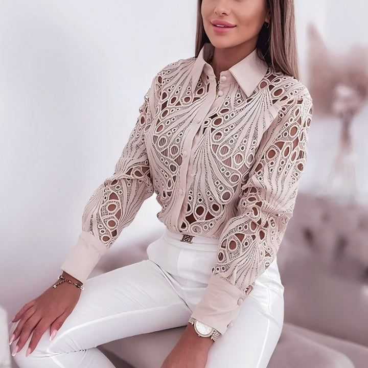Damer elegant blus med unik cut-out design Mirla-Eva Jonsson