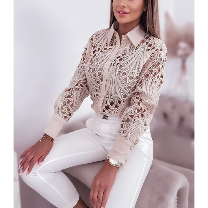 Damer elegant blus med unik cut-out design Mirla-Eva Jonsson
