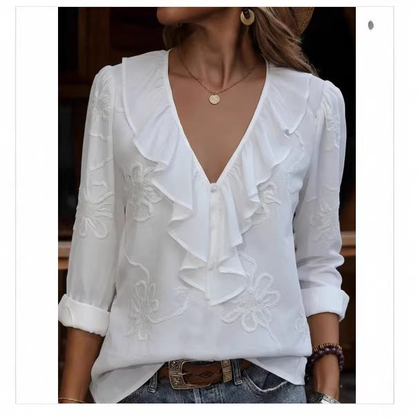 Damer elegant blus med volang och blommig broderimönster Mirla-Eva Jonsson