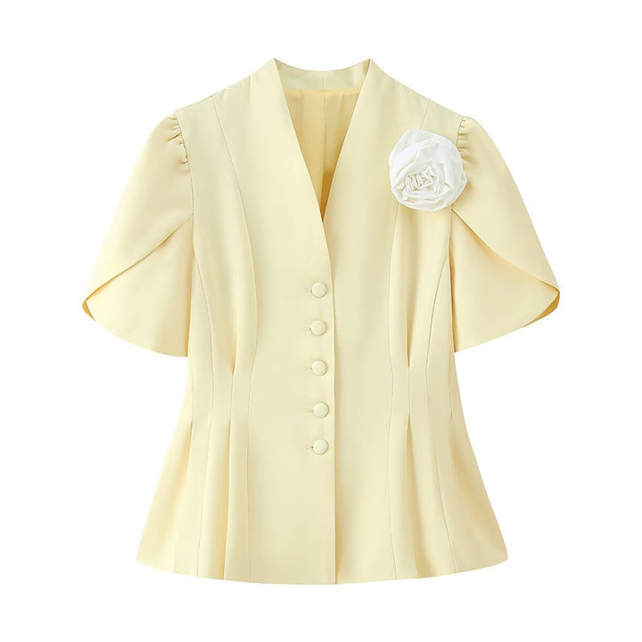 Damer elegant blus med volangärmar och dekorativ blomapplikation Mirla-Eva Jonsson