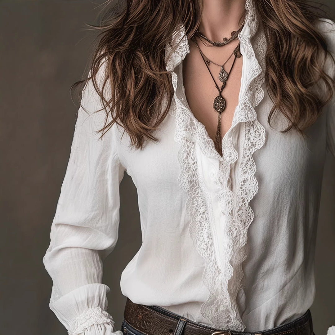 Damer elegant blus med volangdetaljer och spetsbesättning Mirla-Eva Jonsson