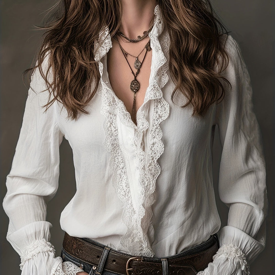 Damer elegant blus med volangdetaljer och spetsbesättning Mirla-Eva Jonsson