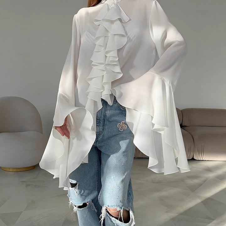 Damer elegant blus med volangdetaljer och vida ärmar Mirla-Eva Jonsson