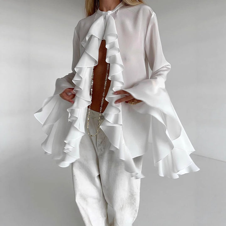 Damer elegant blus med volangdetaljer och vida ärmar Mirla-Eva Jonsson