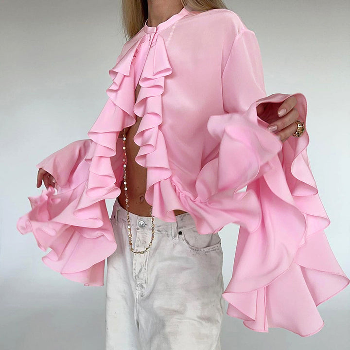 Damer elegant blus med volangdetaljer och vida ärmar Mirla-Eva Jonsson