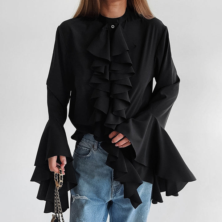 Damer elegant blus med volangdetaljer och vida ärmar Mirla-Eva Jonsson