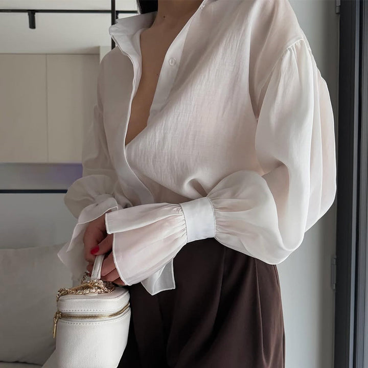 Damer elegant blus med voluminösa ärmar Mirla-Eva Jonsson