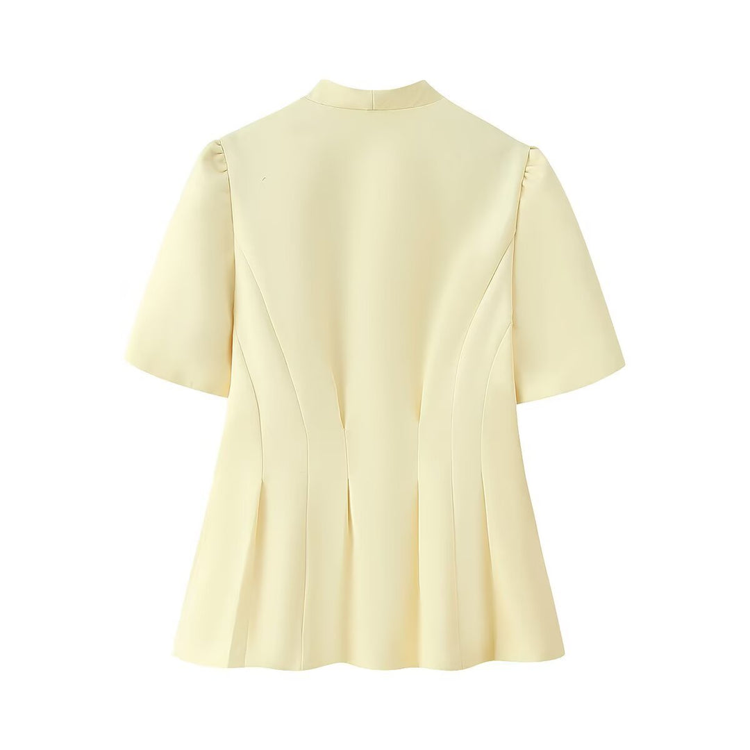 Damer elegant blus med voluminösa ärmar och blommigt detalj Mirla-Eva Jonsson