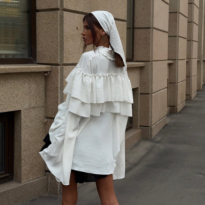 Damer elegant blus med voluminösa volangdetaljer Mirla-Eva Jonsson