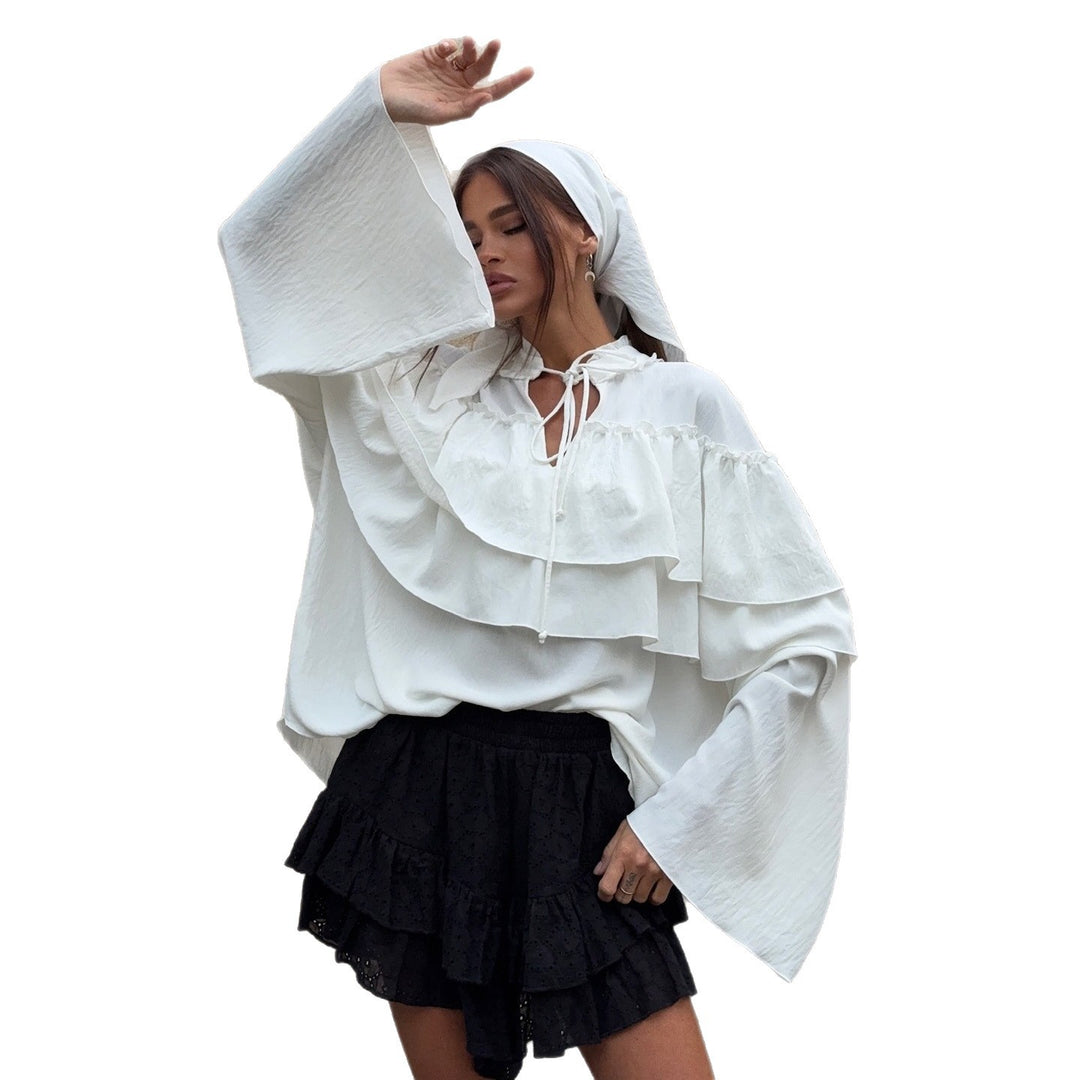 Damer elegant blus med voluminösa volangdetaljer Mirla-Eva Jonsson