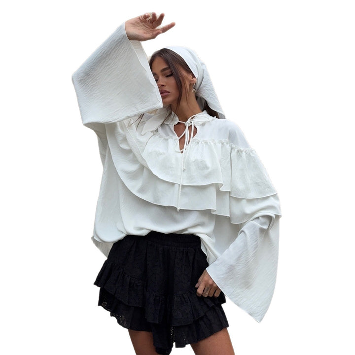 Damer elegant blus med voluminösa volangdetaljer Mirla-Eva Jonsson