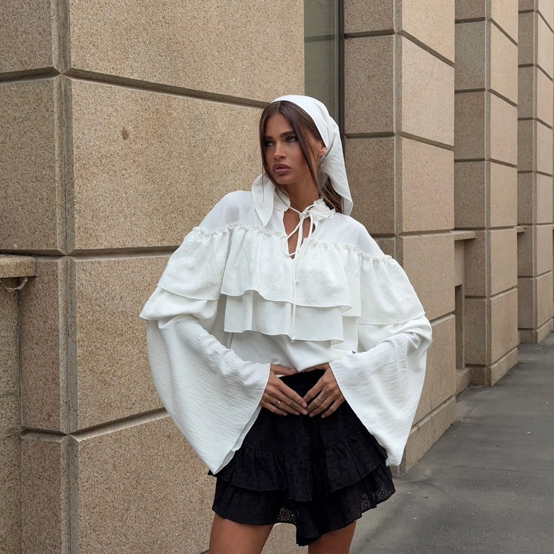 Damer elegant blus med voluminösa volangdetaljer Mirla-Eva Jonsson