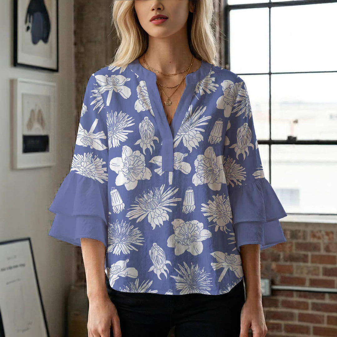Damer elegant blusenshirt med voluminösa ryschärmar och grafisk blommönster Mirla-Eva Jonsson