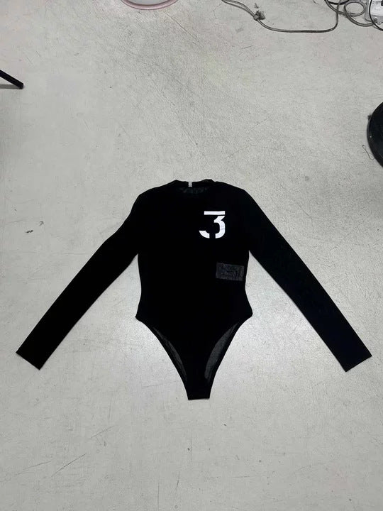 Damer elegant bodysuit med transparenta accenter och lång ärm Mirla-Eva Jonsson