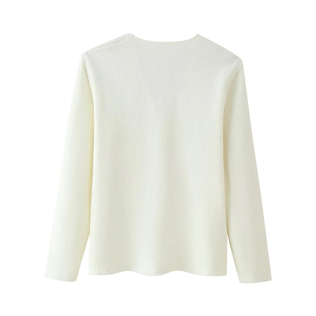 Damer elegant cardigan med V-urringning och dekorativ knap Mirla-Eva Jonsson