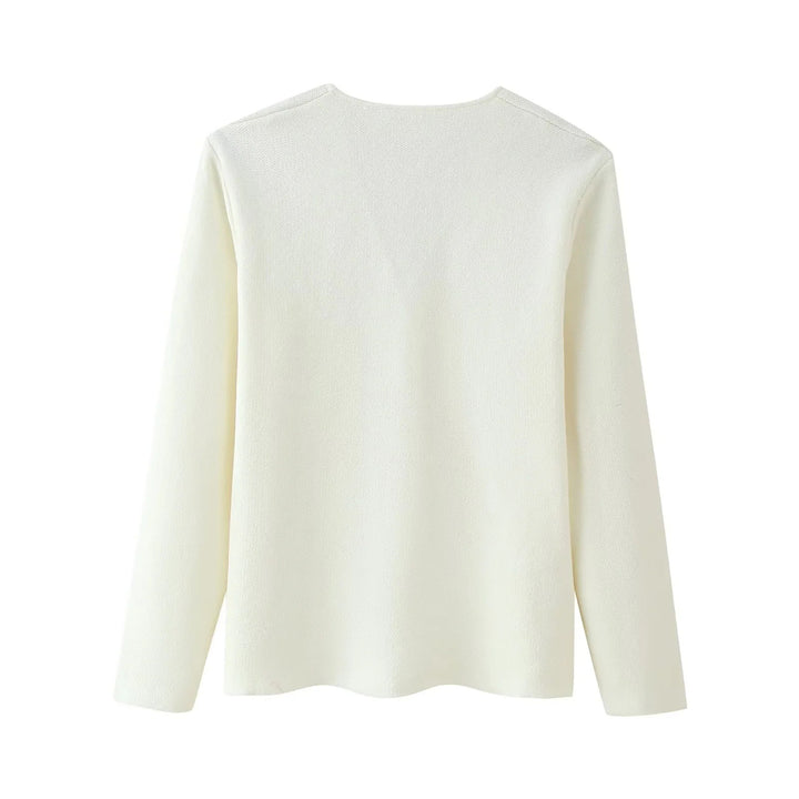 Damer elegant cardigan med V-urringning och dekorativ knap Mirla-Eva Jonsson