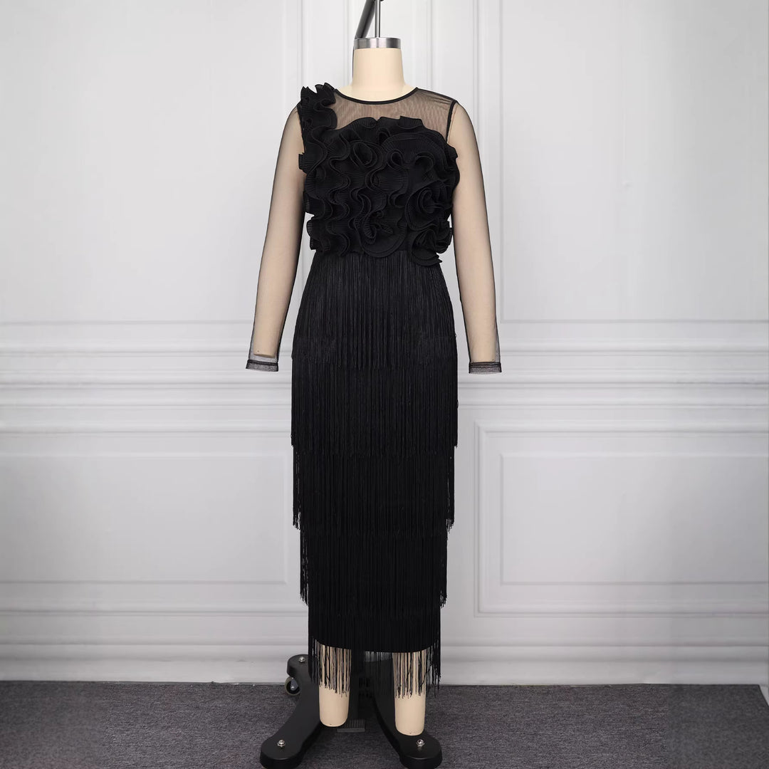 Damer elegant cocktailklänning med voluminösa volangdetaljer och fransar-Eva Jonsson