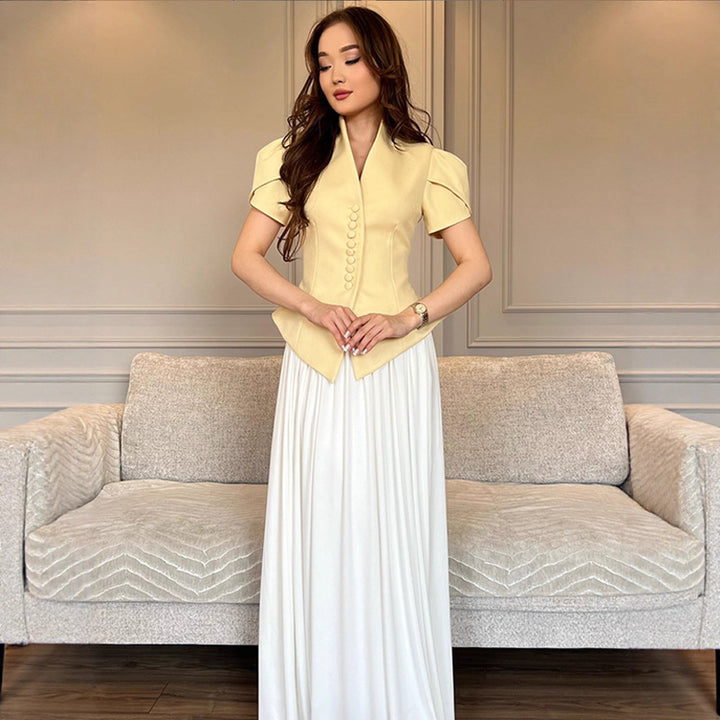 Damer elegant designerblus med puffärmar och knapppdetaljer Mirla-Eva Jonsson