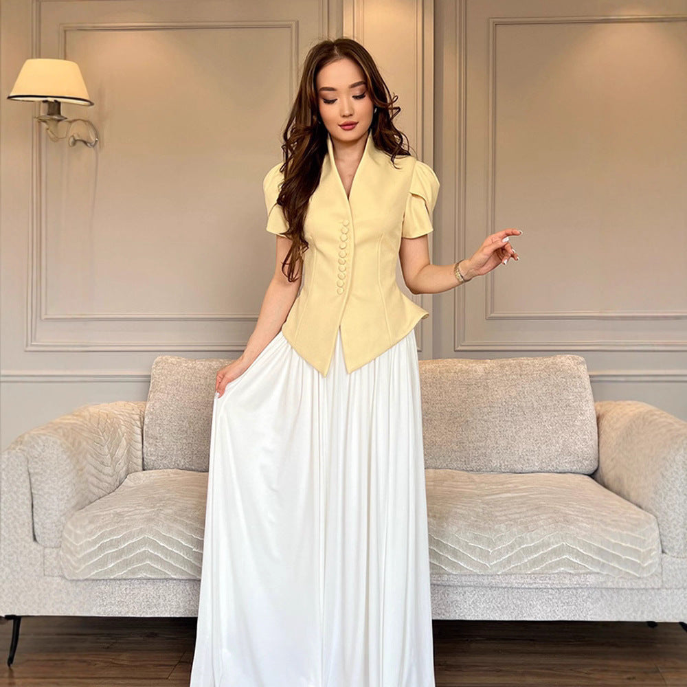 Damer elegant designerblus med puffärmar och knapppdetaljer Mirla-Eva Jonsson