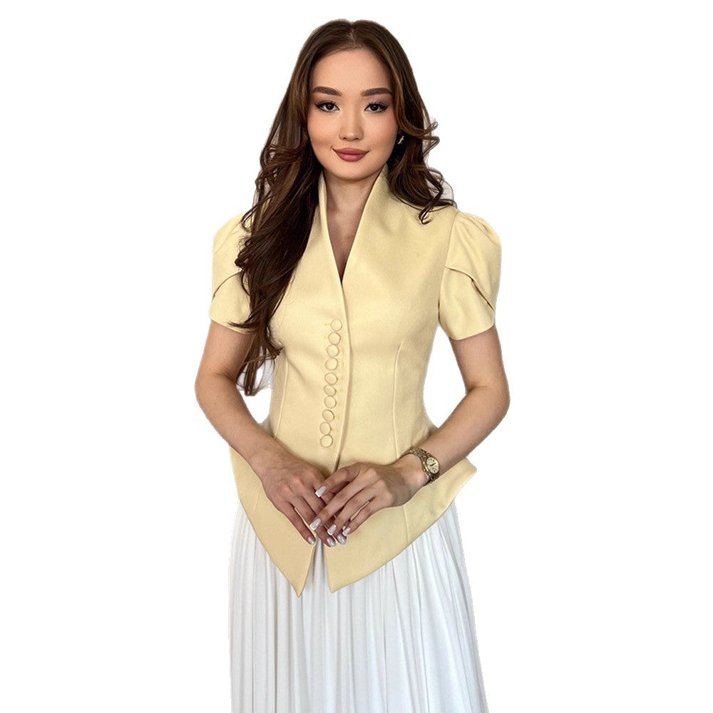 Damer elegant designerblus med puffärmar och knapppdetaljer Mirla-Eva Jonsson