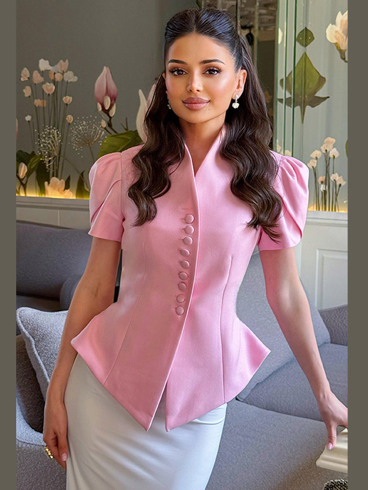 Damer elegant designerblus med puffärmar och knapppdetaljer Mirla-Eva Jonsson
