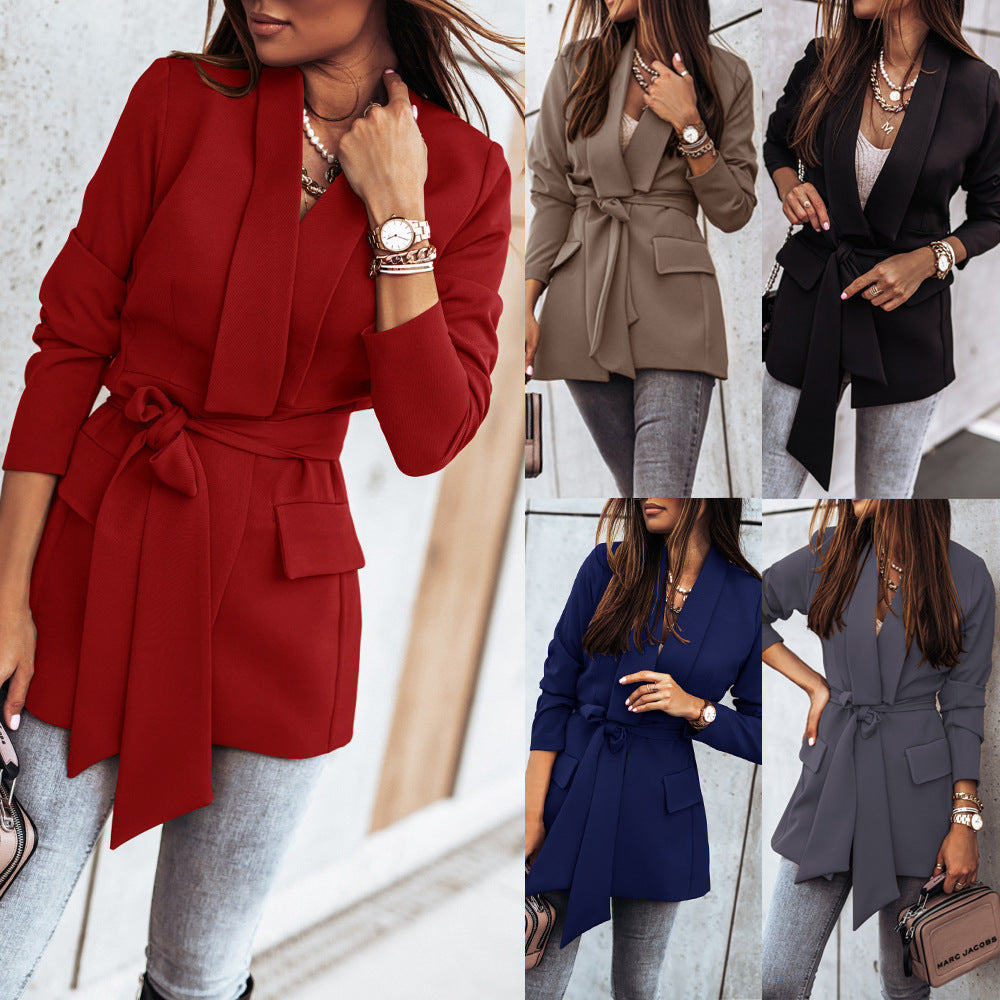 Damer elegant figurformad blazer med bälte och fickor Mirla-Eva Jonsson