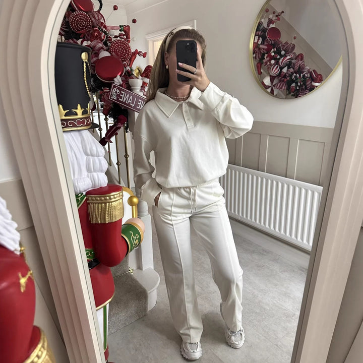 Damer elegant fritidsdräkt med hög krage och vida byxor-Eva Jonsson