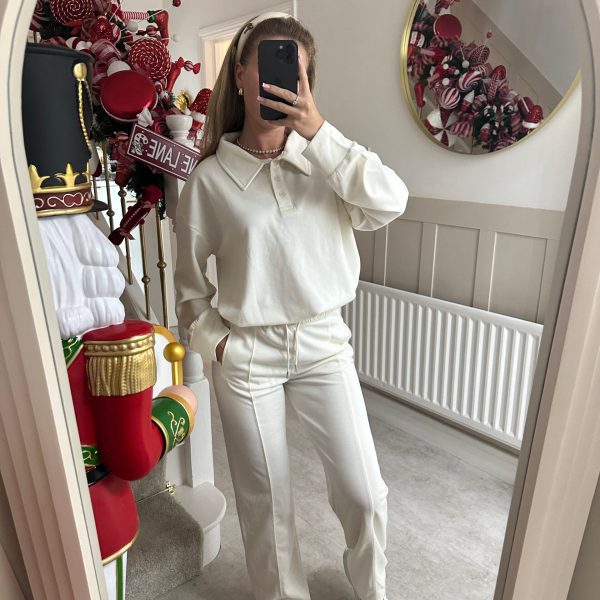 Damer elegant fritidsdräkt med hög krage och vida byxor-Eva Jonsson