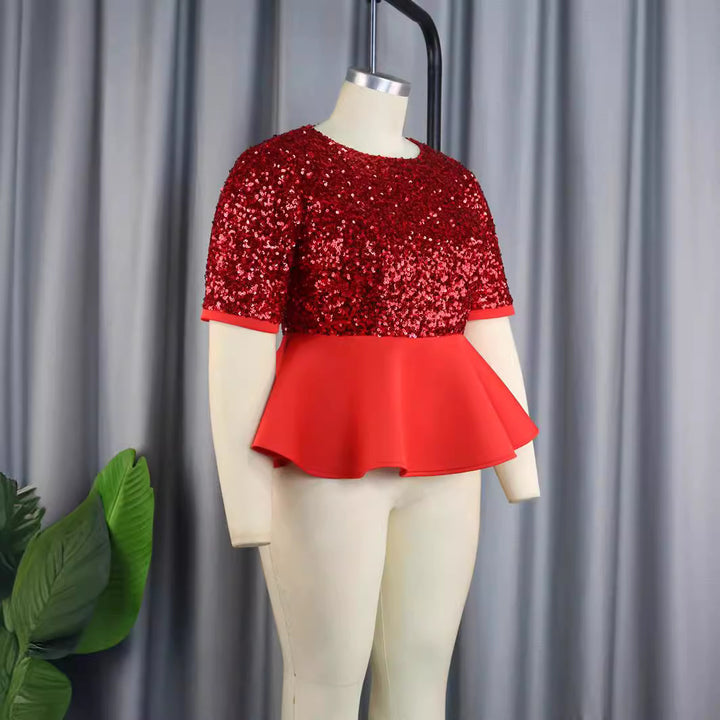 Damer elegant glittrande topp med svängande peplum Mirla-Eva Jonsson