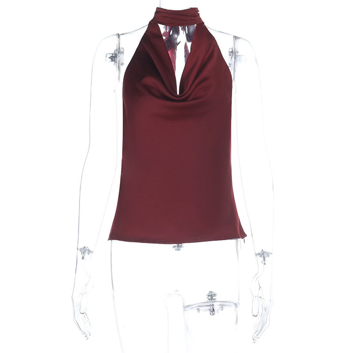 Damer elegant halterneck topp med djup V-hals och figurnära passform Mirla-Eva Jonsson