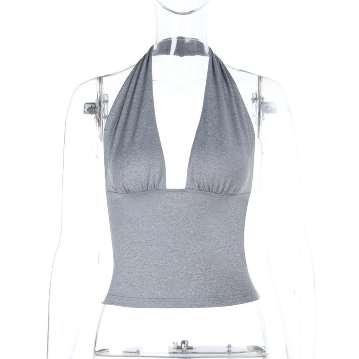Damer elegant halterneck topp med djup V-ringning och figursydd passform Mirla-Eva Jonsson