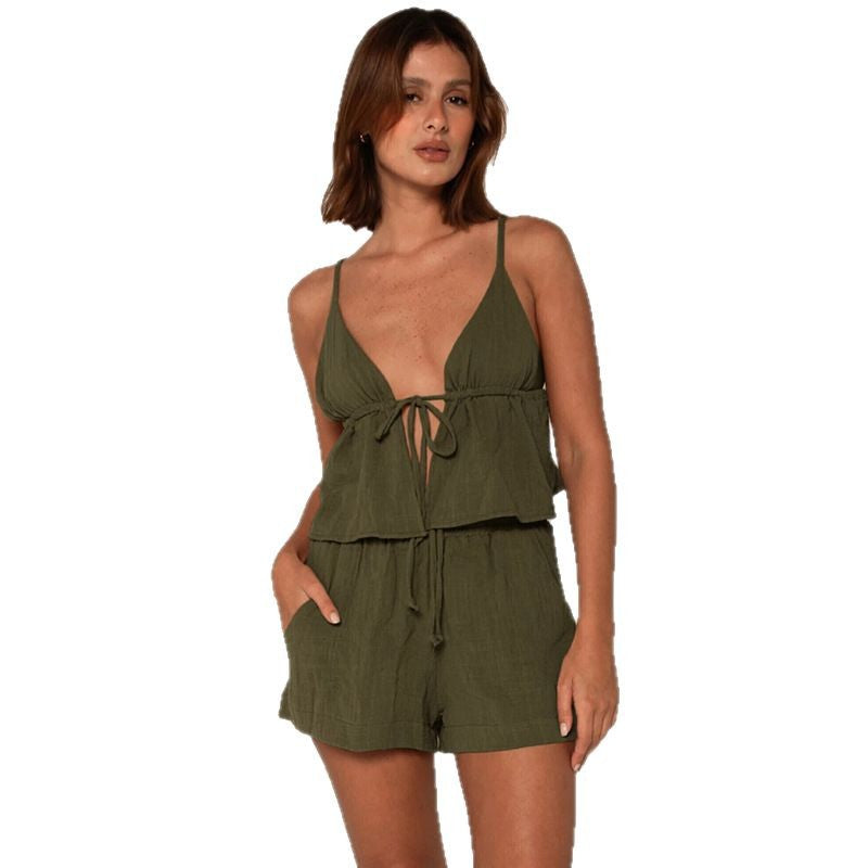 Damer elegant halterneck topp med framträdande rynkning och korta shorts Mirla-Eva Jonsson