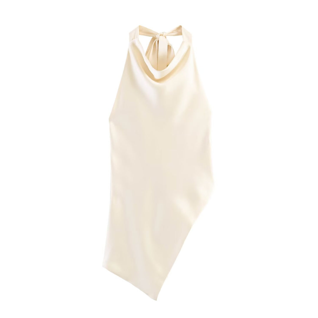 Damer elegant halterneck topp med unik asymmetrisk snitt och dekorativ knut Mirla-Eva Jonsson