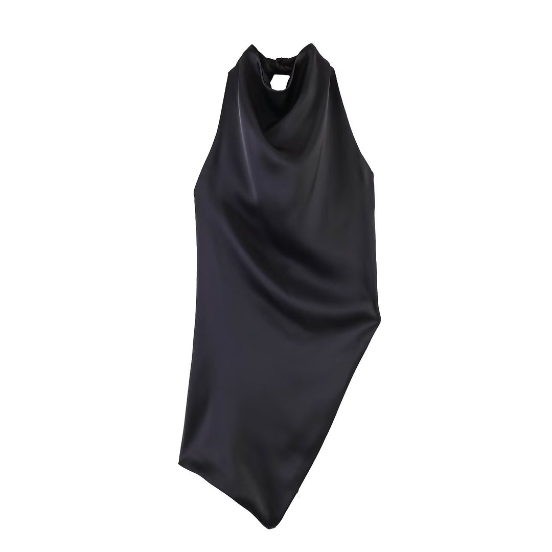 Damer elegant halterneck topp med unik asymmetrisk snitt och dekorativ knut Mirla-Eva Jonsson