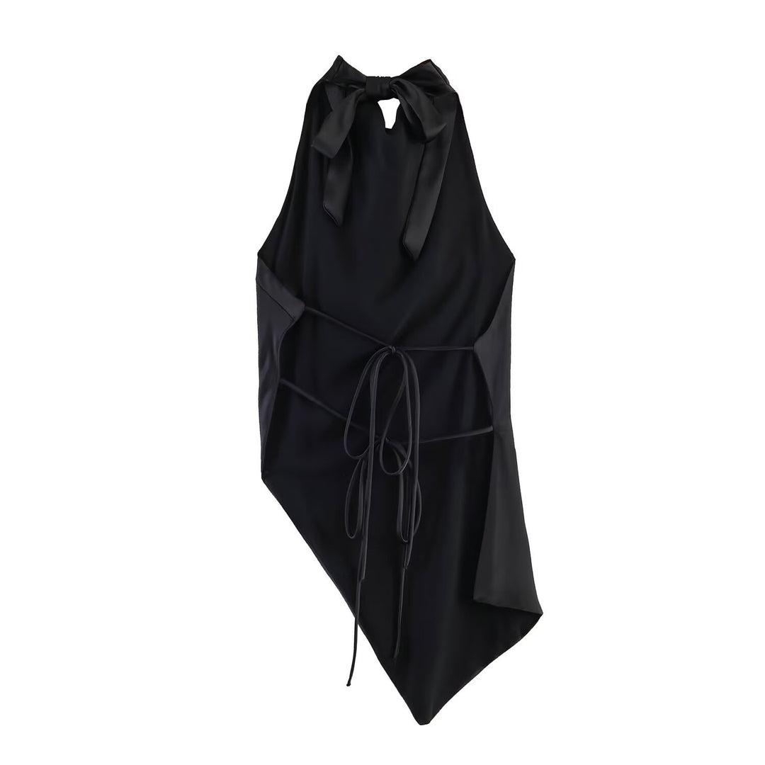 Damer elegant halterneck topp med unik asymmetrisk snitt och dekorativ knut Mirla-Eva Jonsson
