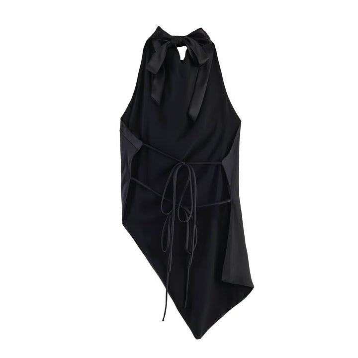Damer elegant halterneck topp med unik asymmetrisk snitt och dekorativ knut Mirla-Eva Jonsson