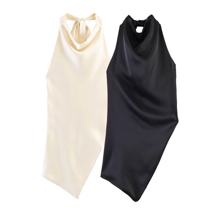 Damer elegant halterneck topp med unik asymmetrisk snitt och dekorativ knut Mirla-Eva Jonsson
