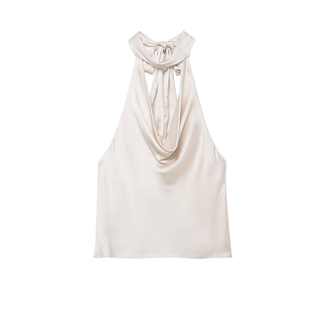 Damer elegant halternecktop i flytande satin med dekorativ ryggöppning Mirla-Eva Jonsson