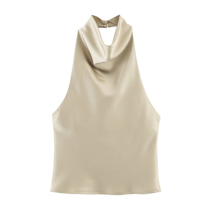 Damer elegant haltertop med flytande skärning och dekorativa detaljer Mirla-Eva Jonsson