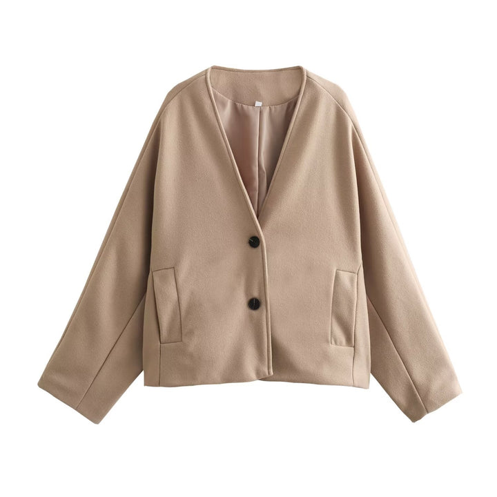 Damer elegant jacka med strukturerad tyg och generösa fickor Mirla-Eva Jonsson