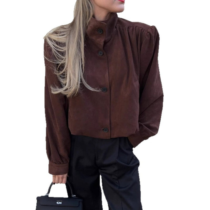 Damer elegant jacka med strukturerade puffärmar och knapppdetail Mirla-Eva Jonsson