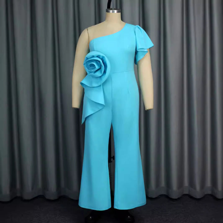 Damer elegant jumpsuit med asymmetrisk design och blommig applikation Mirla-Eva Jonsson