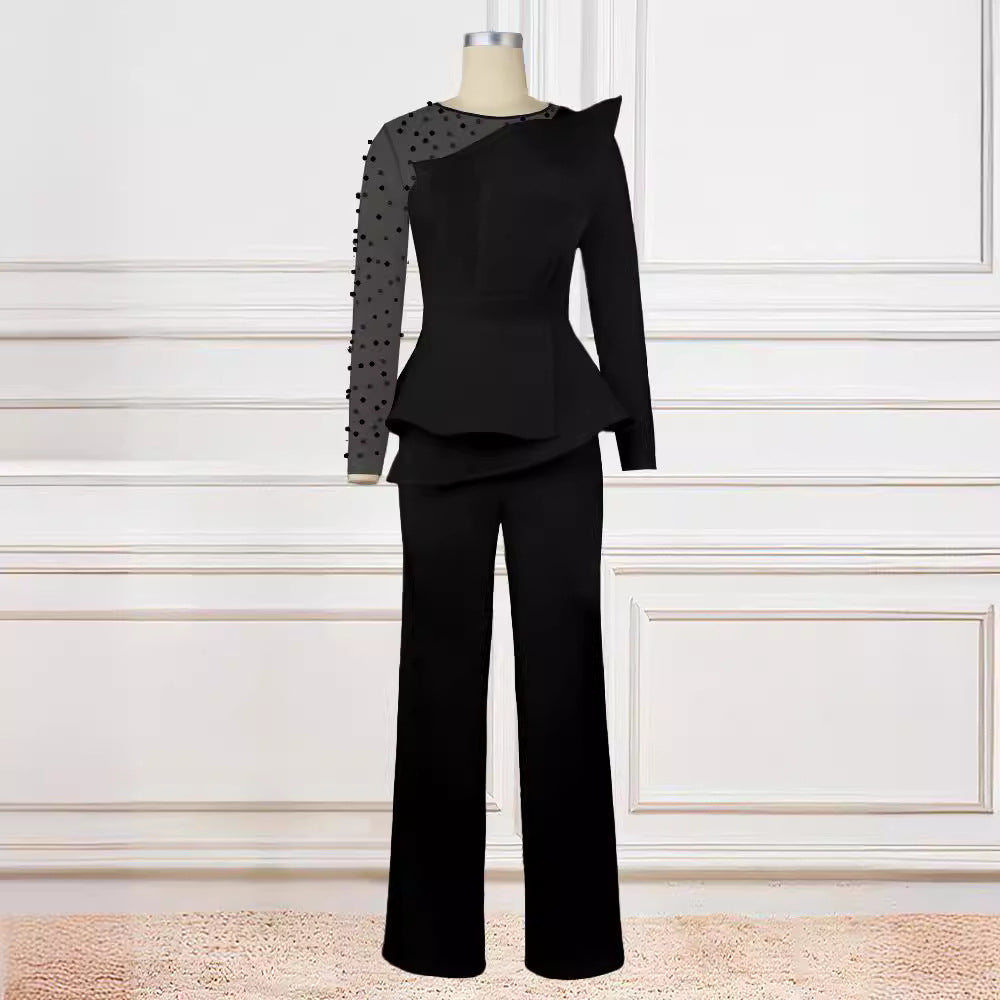 Damer elegant jumpsuit med asymmetrisk överdel och raffinerad volangdesign Mirla-Eva Jonsson